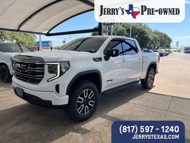 2024 GMC Sierra 1500 AT4 in Summit White — front three-quarter view