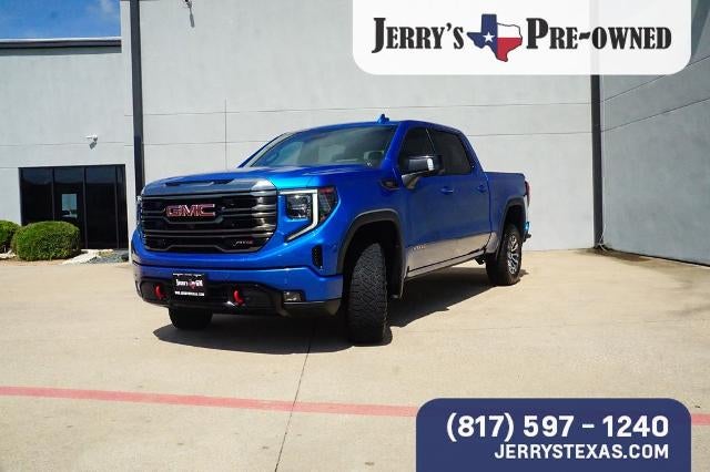 2023 GMC Sierra 1500 AT4 in Dynamic Blue Metallic — front three-quarter view